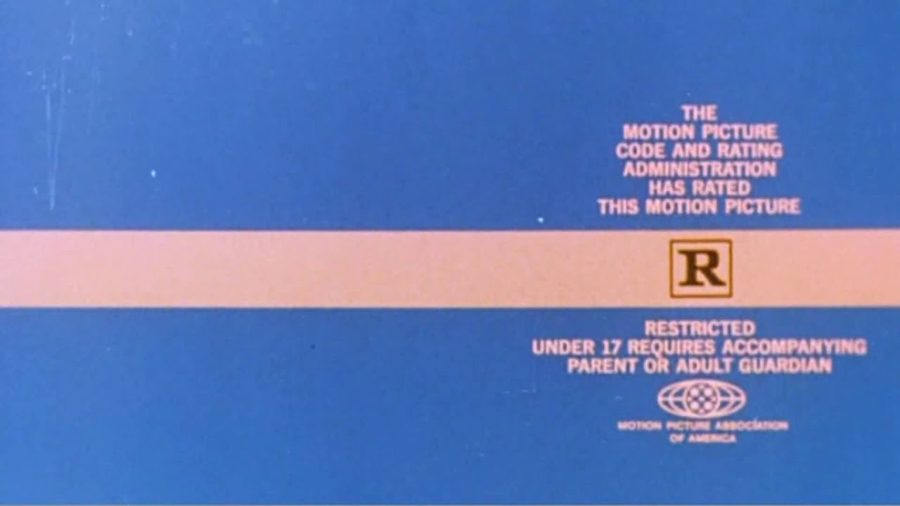 Uma imagem de aviso da MPAA antes de um filme, por volta dos anos 1970, quando profetas e líderes dos santos dos últimos dias alertavam os membros contra assistir a filmes com classificação R, azul com letras brancas.